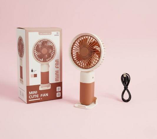 Mini Cute Fan – Portable USB Rechargeable Handheld Cooling Fan for Kids & Adults, Stand/Base Included (Random Color) Rs 462